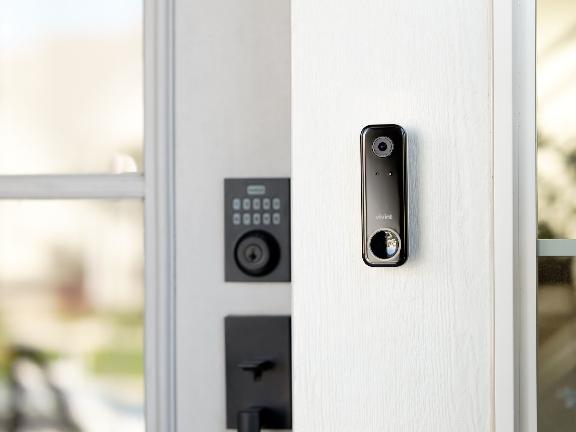 Smart HD Video Doorbell Installed Beside Front Entrance Deadbolt